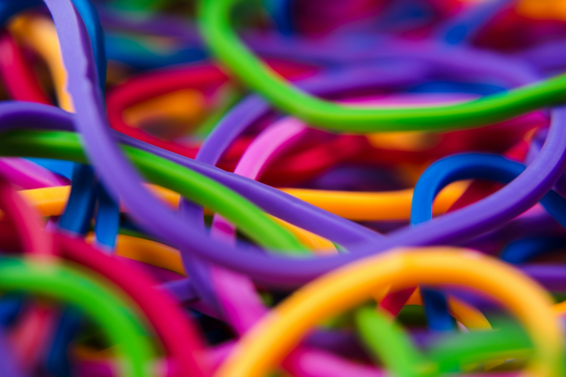 a close up of a bunch of colorful rubber bands